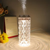 Crystal Table Lamp Air Humidifier emitting mist with soft lighting, enhancing room ambiance and air quality.