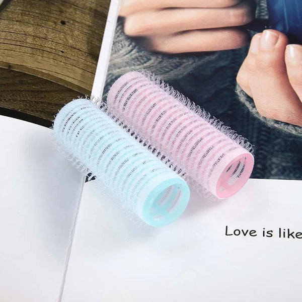 Plastic Hair Curlers Rollers 6pcs in pink and blue, perfect for achieving bouncy curls without heat damage.