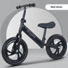 Childrens 12-Inch Balance Bike featuring black wheels and a lightweight design, ideal for young riders learning to balance.