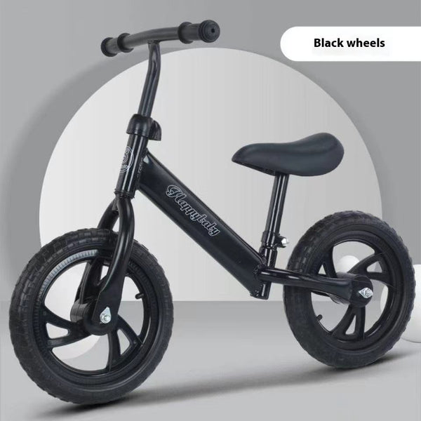 Childrens 12-Inch Balance Bike featuring black wheels and a lightweight design, ideal for young riders learning to balance.