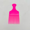 Wide-Tooth Hair Pick Comb in vibrant pink color, perfect for detangling and styling hair.