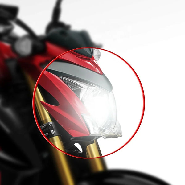 H4 Super White Xenon Auto Bulb illuminating motorcycle headlight for enhanced visibility and safety during night-time driving