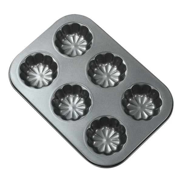 Non-Stick Carbon Steel Bakeware Set with six cavities for baking delightful mini bundt cakes.