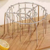 Air Fryer Barbecue Grill Rack and Skewer Set displaying a metallic grill rack on a wooden surface with a lemon.