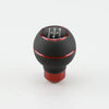 Universal 5-Speed Leather Gear Shift Knob with red accents for enhanced driving comfort and precision.
