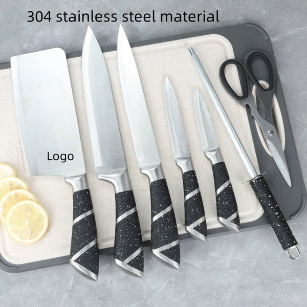 Stainless Steel 8 Piece Kitchen Knife Set displayed on a cutting board with lemon slices.