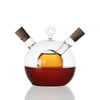Dual-Core Borosilicate Glass Oil & Vinegar Dispenser showcasing oil and vinegar in separate chambers.