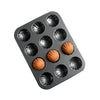 Carbon Steel Shell Shape Baking Mold with baked madeleines in a durable tray for perfect fluted treats.