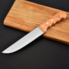 Wooden Handle Chef Knife - Multi Size on a wooden cutting board, showcasing its elegant design and functionality.
