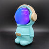 A colorful astronaut Stereo Woofer Bluetooth Speaker with a glowing helmet, showcasing a fun design for music lovers.