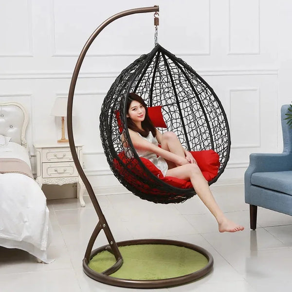Modern Indoor-Outdoor Swing Chair featuring a comfortable design with a hanging seat and stylish decor.