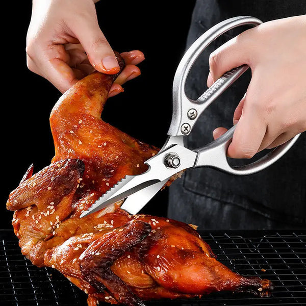 Multi-Function Stainless Steel Kitchen Scissors cutting through roasted poultry.