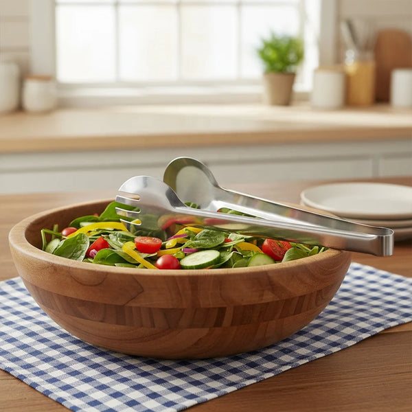 Stainless Steel Small Food Clip holding salad in a wooden bowl on a checkered tablecloth.
