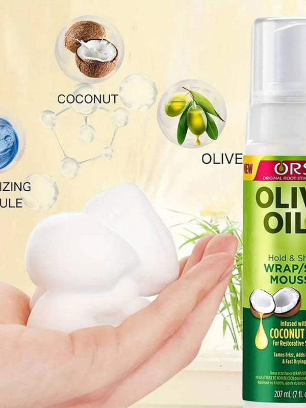 Strong Hold Shine Hair Mousse in hand with coconut and olive oil benefits illustration.
