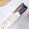 Non-Stick Stainless Steel 6 Piece Knife Collection inside sleek packaging on marble countertop.