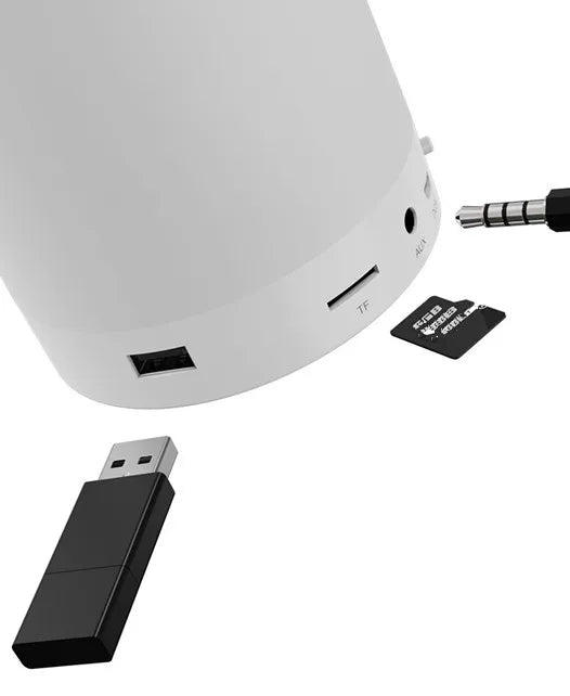 Close-up of the Smart Portable Plastic LP-25125 Wireless Speaker Lamp with USB and audio ports.