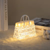 Crystal Bag USB Night Lamp illuminating a cozy bedside environment with an elegant design.