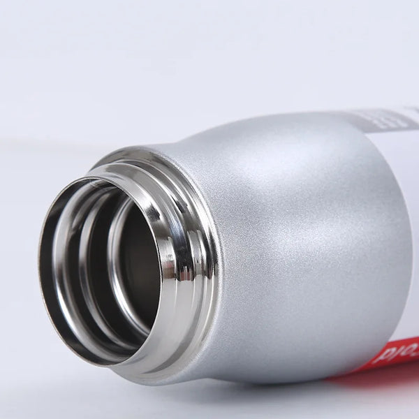 Close-up view of the Stainless Steel Vacuum Insulated Flask opening, showcasing its sleek design and durable materials.