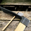 Carbon Steel Wooden Handle Garden Hoe showing the blade and wooden handle on a rustic wooden surface.