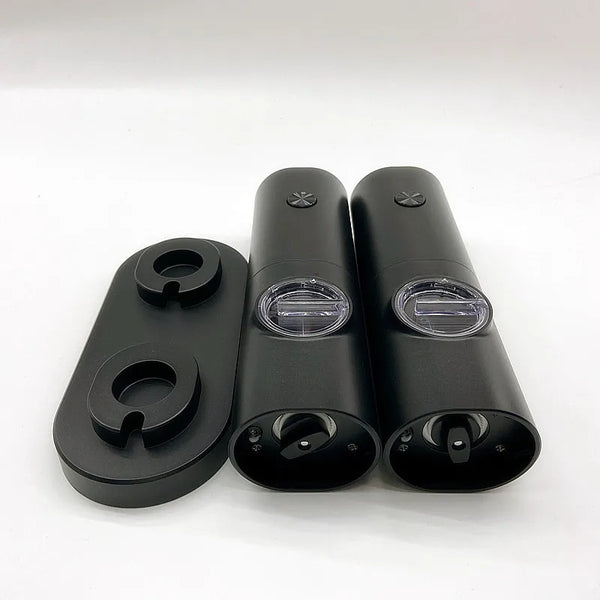 Electric Salt & Pepper Grinder Set featuring sleek black design and convenient holder for effortless seasoning.