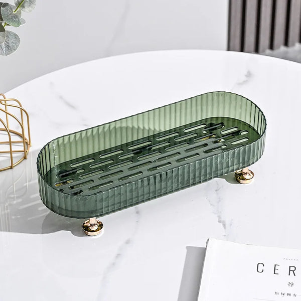 Household Kitchen Chopsticks Draining Tray on a marble table, featuring a green design and golden feet for stylish organization.