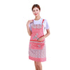 Strap Apron with Adjustable Neck Strap worn by a model, featuring floral design and pockets, suitable for kitchens and events.