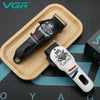 V-699 Professional Electric Hair Clipper displayed on a wooden tray, showcasing its sleek design and precision features.