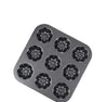 Non-Stick 9-Cavity Square Muffin Pan with decorative fluted edges for baking uniform treats.