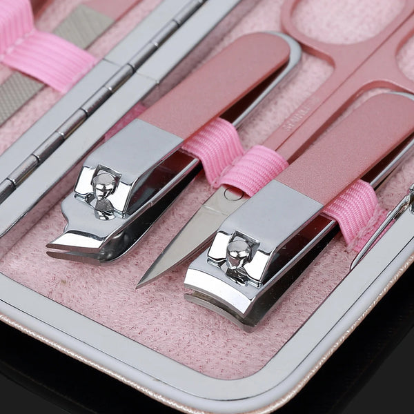 7 Piece Luxury Classic Nail Trimmer Kit with pink grooming tools and nail clippers.