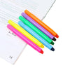 Bible Highlighter Set - vibrant gel highlighters resting on a page, perfect for neat highlighting in Bibles and notebooks.