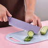Cutting cucumber with a non-stick stainless steel knife from the Non-Stick Stainless Steel 6 Piece Knife Collection.