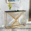Nordic Golden Marble Console Table with gold geometric base and black top, styled with flowers and decorative items.