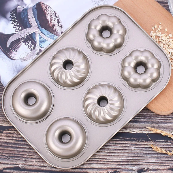 Non-Stick 6-Cavity Mini Fluted Tube Pan for baking elegant mini Bundt cakes and desserts.