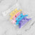 12 Piece Butterfly Hair Sectioning Clips in a clear packaging with various colors including yellow, pink, blue, and purple.