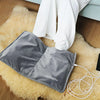 USB Graphene Constant Temperature Foot Warmer placed on a soft surface, providing warmth and comfort.