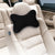 Soft Memory Foam Car Neck Rest Pillow on a beige car seat for ergonomic support during commutes.