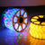 100m Heavy Duty Extension Cable Reel with vibrant blue, purple, and yellow lighting effects on a spool.