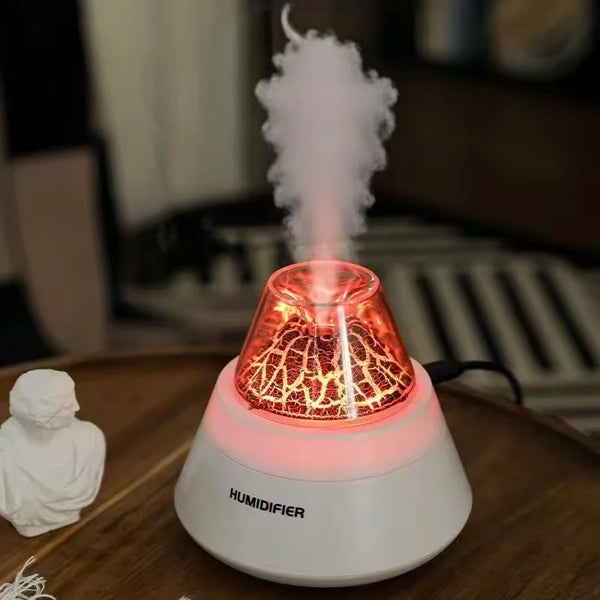 USB Mini Volcano Humidifier emitting mist with a warm red glow, enhancing air quality and ambiance in any space.