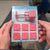 Hand Press Pastry & Mooncake Mold Set displayed with pink molds and a press tool for baking and decorating.