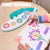 Child using the Magic Light Drawing Pen Set with LED Glow Board to create colorful drawings on paper.