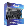 PS3 Wireless Controller + Charging Cable in packaging for enhanced gaming experience.