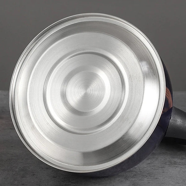 Bottom view of Stainless Steel Whistling Flat Bottom Kettle showcasing its sleek design and durable material.