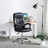 High-Back Reclining Boss Ergonomic Office Chair in black leather, placed beside a desk with a lamp and a plant.
