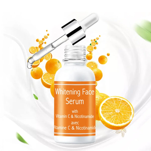 Niacinamide and Vitamin C Dark Spot Serum in an elegant dropper bottle with citrus elements.