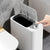 Covered Trash Can featuring a sleek design with lid, ideal for keeping waste contained and odor-free.