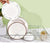 Metal Wire Dish Drying Rack with plates being placed for drying in a modern kitchen setting.
