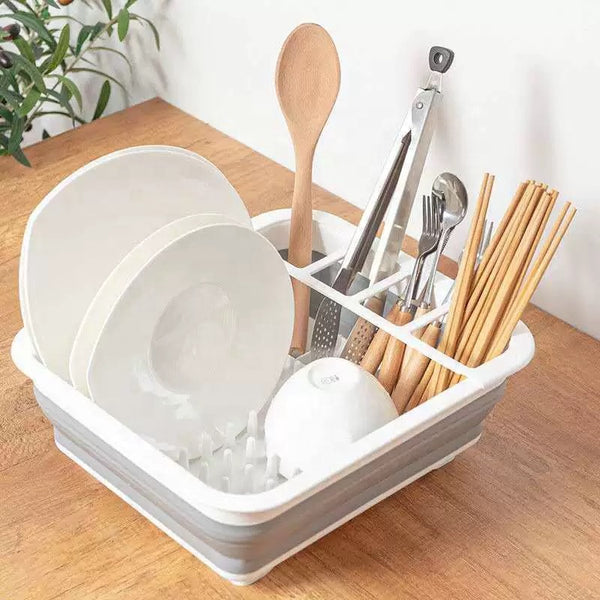 Collapsible Dish Drainer Dinnerware Portable Folding Rack with plates and utensils organized.