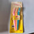 Razor Sharp Eyebrow Shaver 3-Pack featuring three eyebrow razors in pink and blue with safety covers.