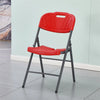 Foldable Plastic Outdoor Chair with Metal Frame in red color on a tiled floor against a light blue wall.