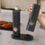 Electric Salt & Pepper Grinder Set displayed on a kitchen counter, showcasing its sleek design and ease of use.